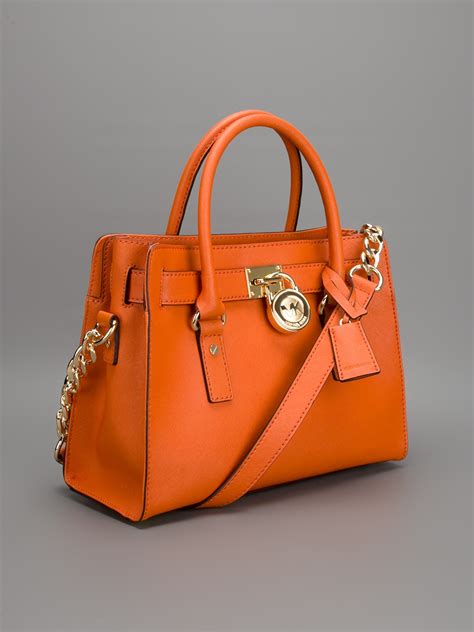 sacoche michael kors orange gunmetal|Michael Kors orange bag.